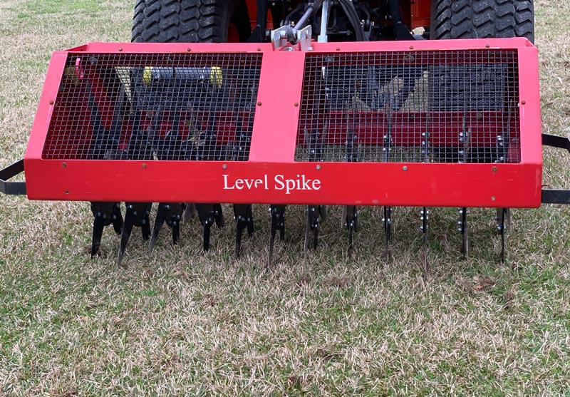 Turfgrass cultivation methods: A roster Turf slicer spiker machine