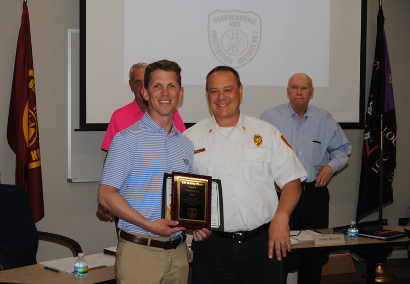 Superintendent honored for lifesaving efforts Peter Schmidt superintendent