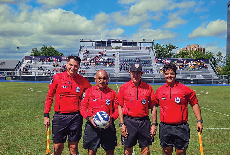 Arturo Hernandez mowing