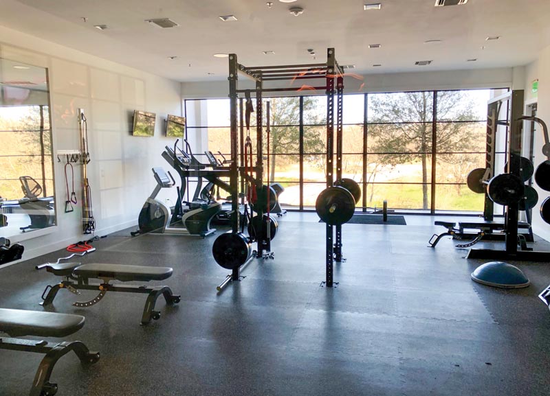 Inside the new crop of college golf practice facilities SMU weight room