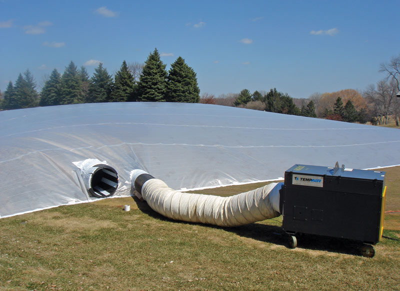 Winter turf damage: The green in the bubble Golf green greenhouse